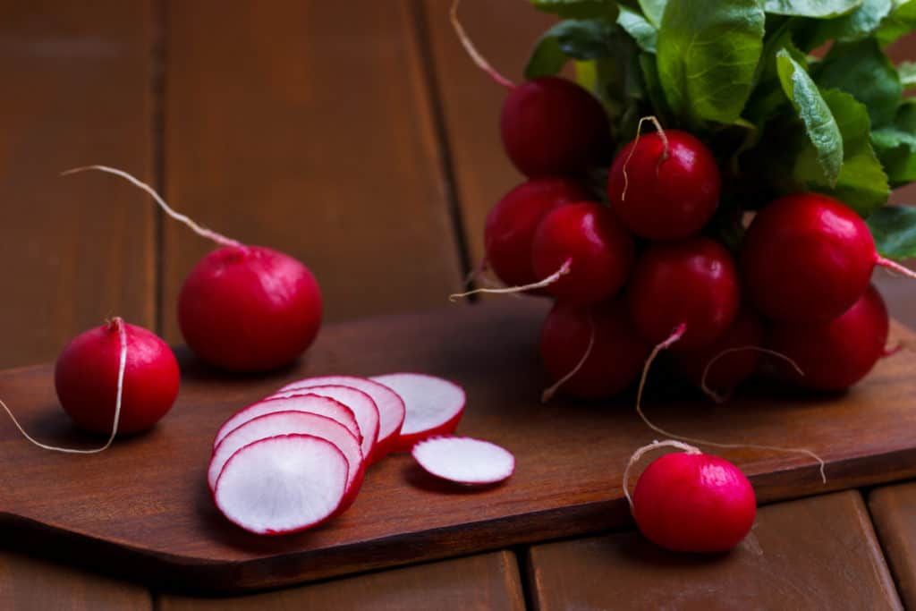Radish Microgreens Nutrition: Health Benefits, Varieties and How To Grow 2 YayImages_RadishMicrogreensNutrition_ripe-sliced-radish