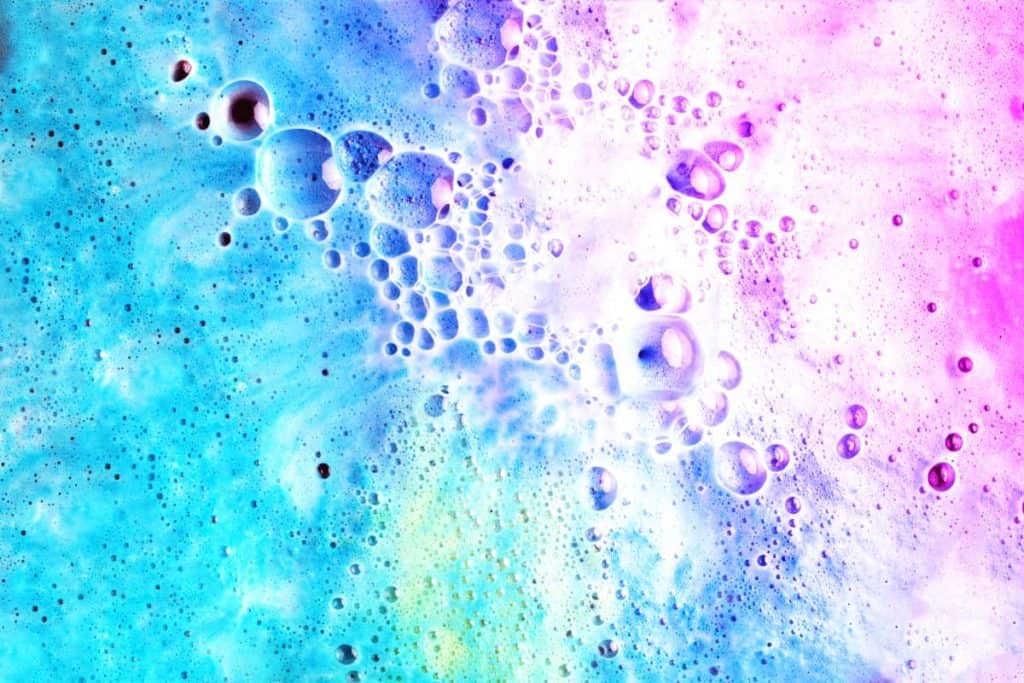 How to use a bath bomb in the shower, colorful bath bomb water