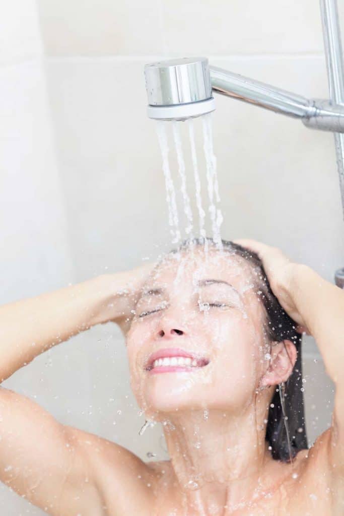 How to use a bath bomb in the shower, shower woman washing